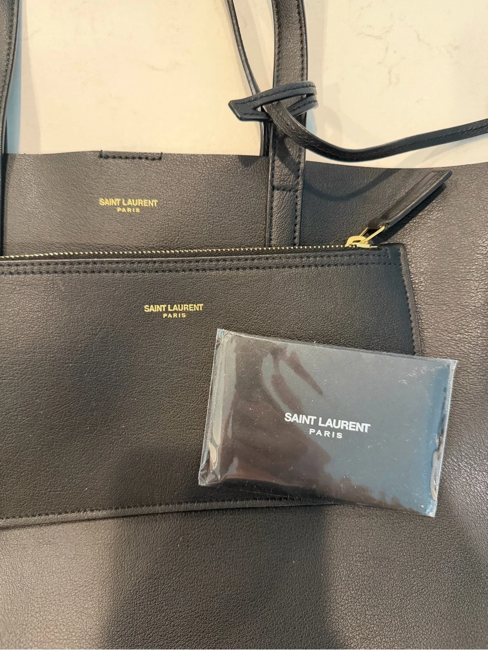 Saint Laurent Black Leather Messenger Bag with Gold Logo